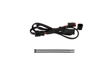 Load image into Gallery viewer, Diode Dynamics DD4189 Powers an SSC1 LED pod in the 2023+ Chevrolet Colorado trailer hitch receiver.