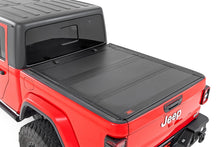 Load image into Gallery viewer, Rough Country 49620500 Hard Tri-Fold Tonneau Bed Cover for Select Jeep Gladiator
