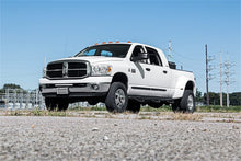 Load image into Gallery viewer, Rough Country 70568 LED Light Bar Bumper Mounting Brackets for Select Dodge Ram 2500, Dodge Ram 3500, Ram 2500, Ram