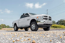 Load image into Gallery viewer, Rough Country 70569 LED Light Bar Bumper Mounting Brackets for Select Dodge Ram 2500, Dodge Ram 3500, Ram 2500, Ram