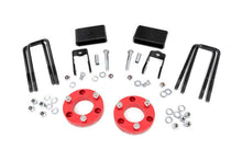 Load image into Gallery viewer, Rough Country 868RED Leveling Lift Kit for Select Nissan TITAN XD