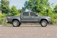 Load image into Gallery viewer, Rough Country 744RED Front Leveling Kit for Select Toyota Tacoma